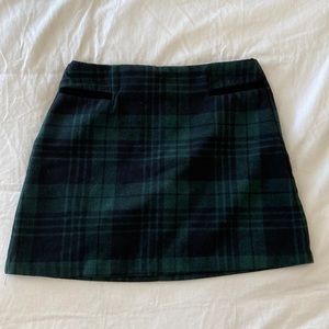 Green and black plain ‘Copper Key’ skirt.